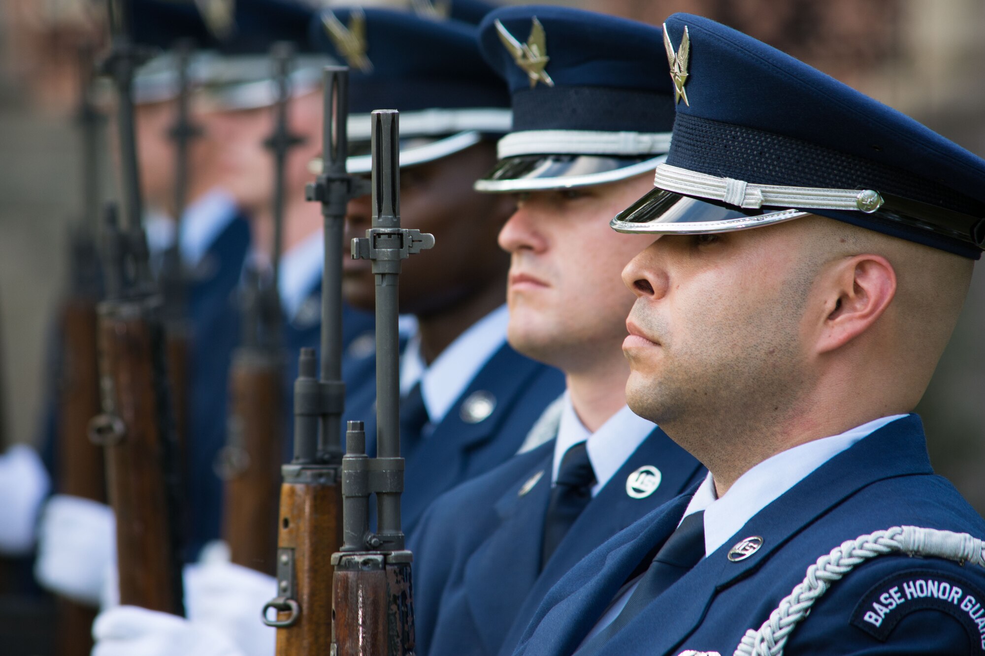 375 Air Mobility Wing honor guard members stand at attention during a memorial retreat at Scott Air Force Base, Ill., Sept. 11, 2013. The retreat was held in honor of the men and women who lost their lives during the attacks on Sept. 11, 2001. (U.S. Air Force photo/Staff Sgt. Jonathan Fowler)