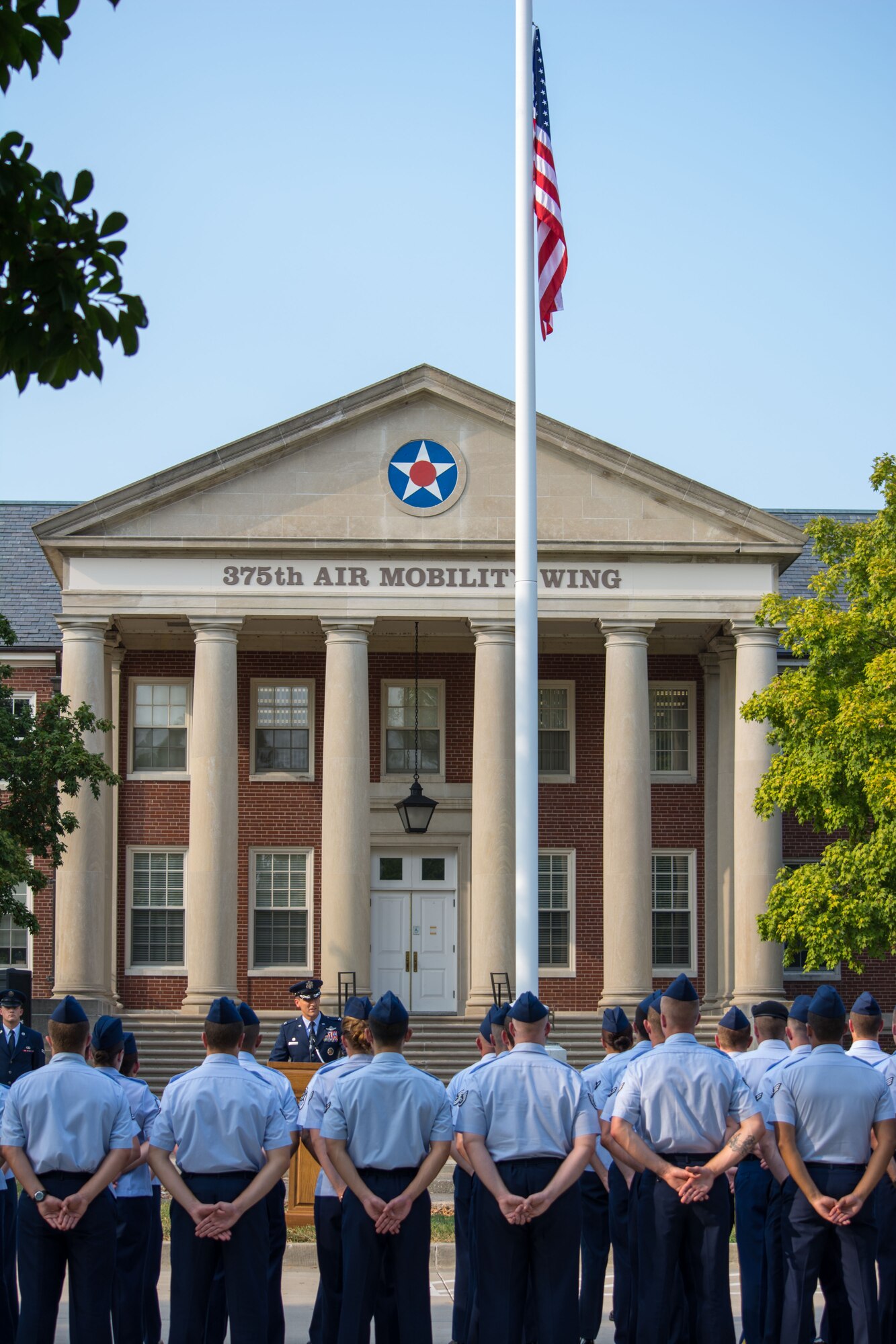 Col. Kyle Kremer speaks in front of a formation during a Sept. 11 memorial retreat at Scott Air Force Base, Ill., Sept. 11, 2013. Kremer presided over the ceremony which was held in remembrance of all those lost on Sept. 11, 2001. Kremer is the 375 Air Mobility Wing commander. (U.S. Air Force photo/Staff Sgt. Jonathan Fowler)