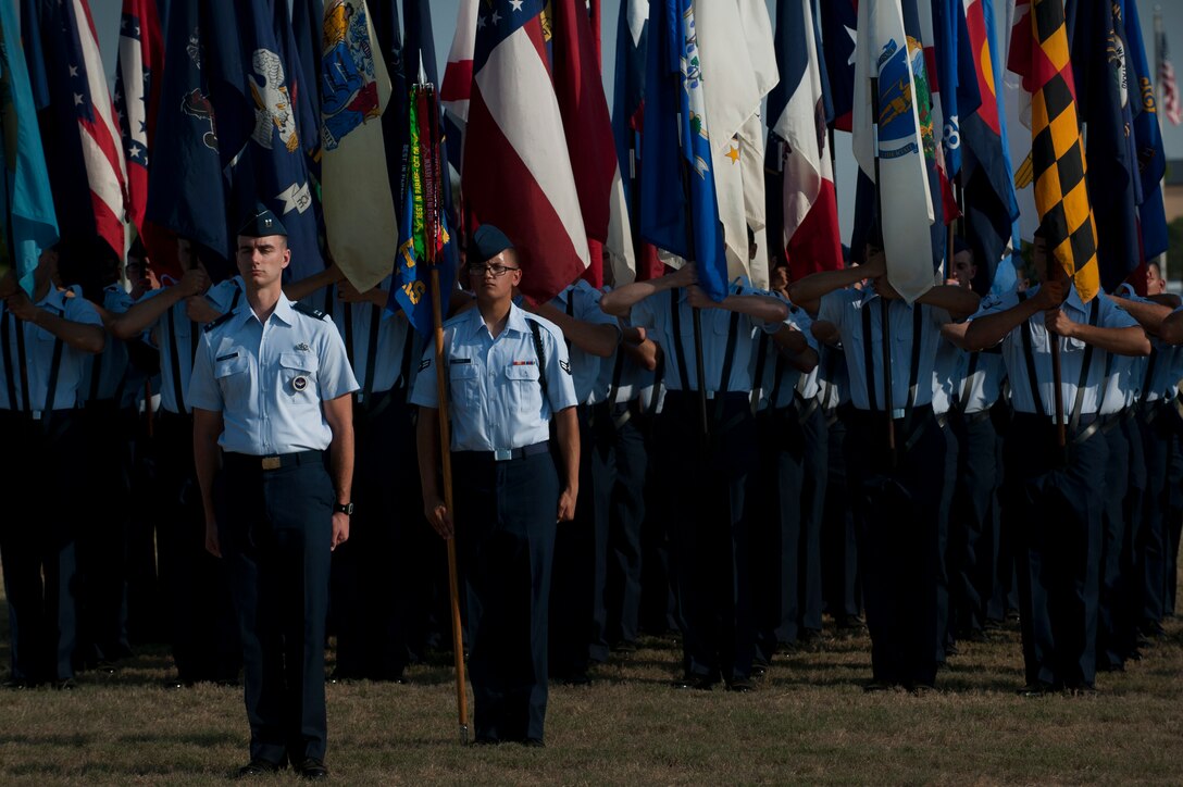 Capt. Michael Makaryk, 82nd Training Squadron, leads the flags flight during pass and review at the 82nd Training Wing change of command ceremony Sept. 12, 2013. Brig. Gen. Scott Kindsvater took command of the largest technical training base from Brig. Gen. Michael Fantini. Maj. Gen. Leonard Patrick, 2nd Air Force commander, presided over the ceremony. (U.S. Air Force photo/Staff Sgt. Mike Meares)