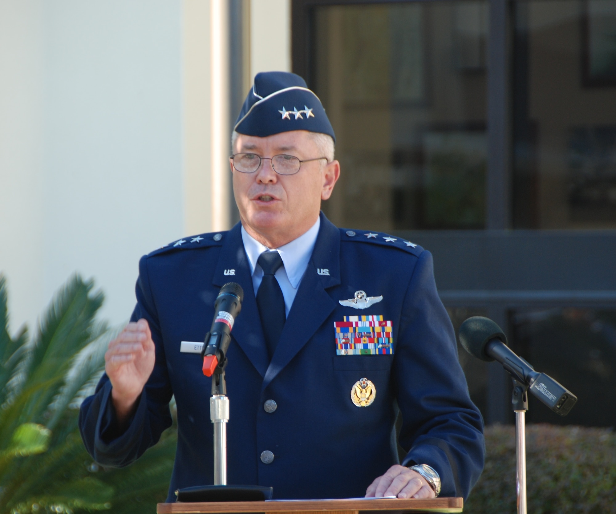 U.S. Air Force Lt. Gen. William Etter, Continental U.S. North American Aerospace Defense Command Region-1st Air Force (Air Forces Northern) commander, speaks to his command during a memorial service Sept. 11, 2013, in front of the 601st Air and Space Operations Center at Tyndall Air Force Base, Fla. The 601st AOC held a ceremony to honor the memory of those who lost their lives during the tragic events of Sept. 11, 2001. (Air National Guard photo by Capt. Jared Scott/Released)
 

