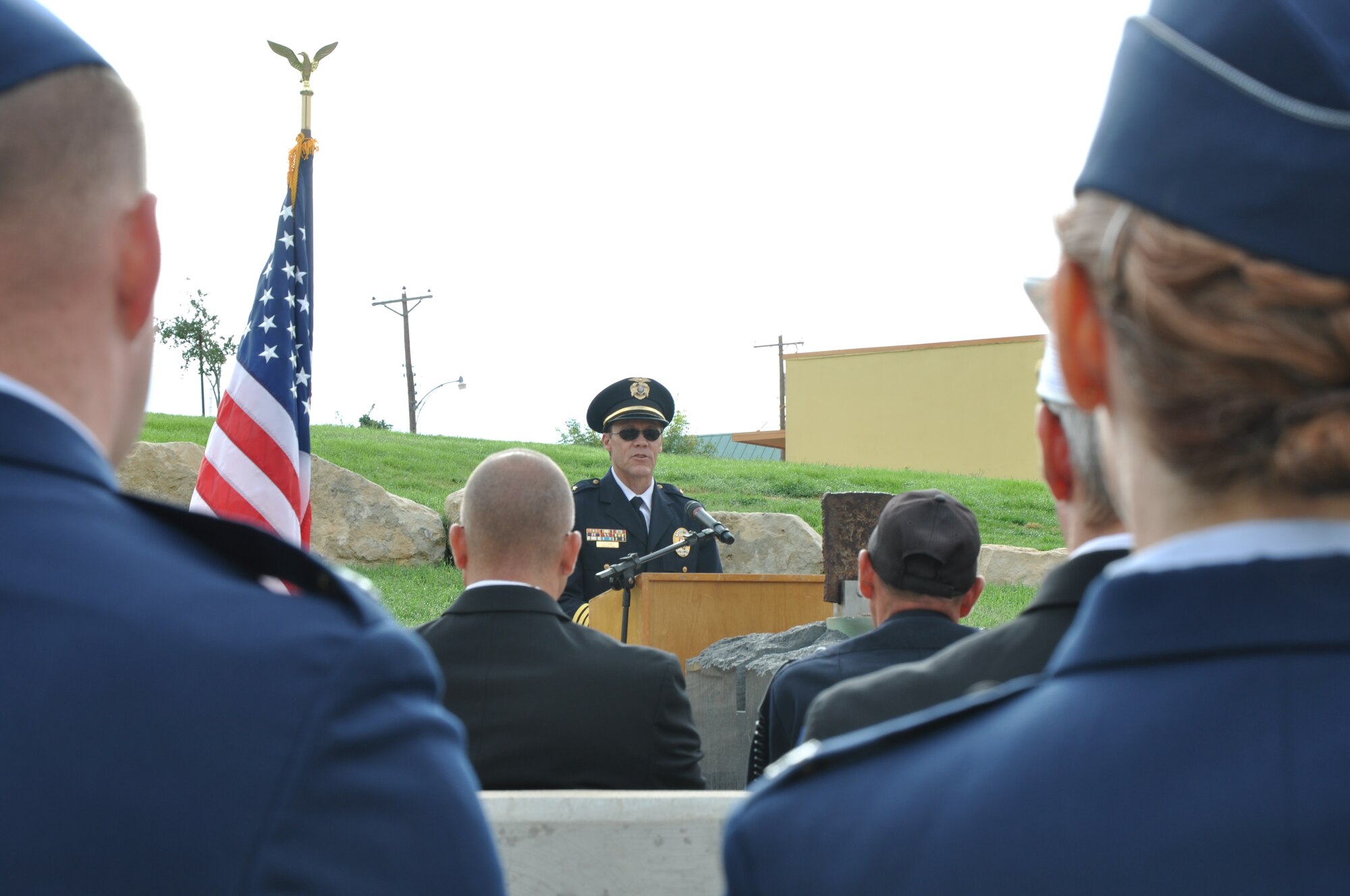 SAN ANGELO, Texas - Jeff Fant, San Angelo Police Department Assistant Chief, speaks about how he feels 9/11 is more than just a date to him at the San Angelo 9/11 memorial Sept. 11. He also said he believes that this day will live on in the hearts of Americans. (U.S. Air Force photo/ Airman 1st Class Joshua Edwards)