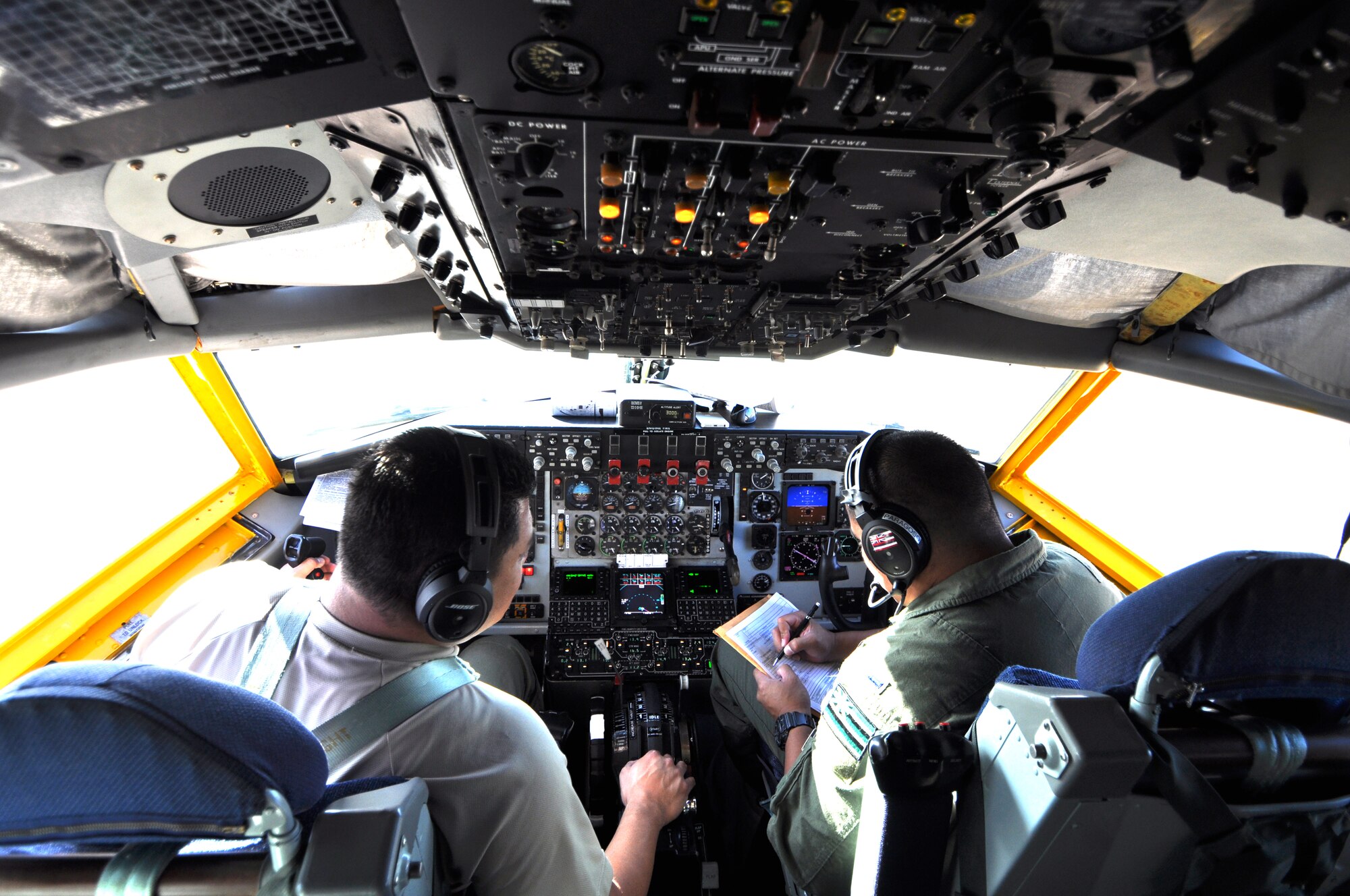 Aircrew members from the 154th Wing, Hawaii Air National Guard, Joint Base Pearl Harbor-Hickam, go through final pre-launch procedures, Aug. 30 as this KC-135 prepares for its journey to its new home. (U.S. Air Force Photo/Maj. Jon Quinlan)