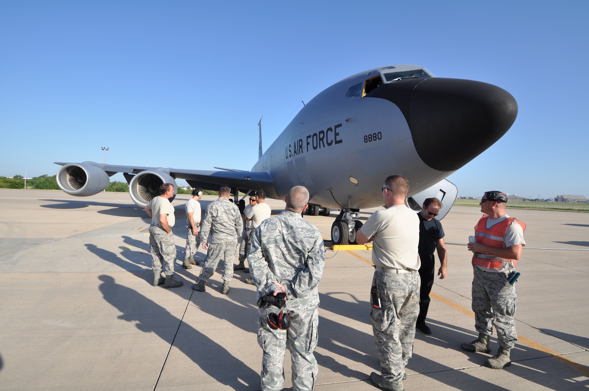 Maintenance crews from the 507th, 137th Air Refueling Wings and the Hawaii Air National Guard prepare to launch, tail 38880 for the last time. As part of the force structure changes authorized by the National Defense Authorization Act last year, this KC-135 is one of four wing aircraft being relocated this summer. (U.S. Air Force photo/Senior Airman Mark Hybers)