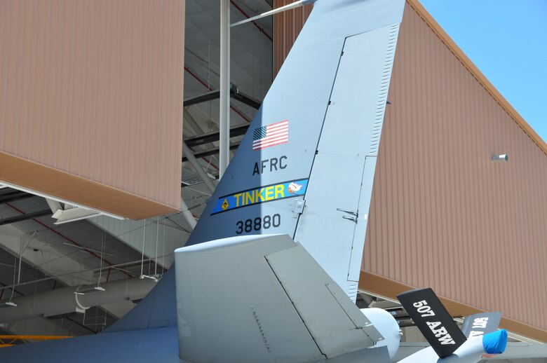 KC-135R tail number 38880 is pulled into the hangar for final maintenance inspections and to remove 507th and 137th Air Refueling Wing decals in preparation for it to be transferred to Joint Base Pearl Harbor-Hickam, Hawaii. (U.S. Air Force Photo/Senior Airman Mark Hybers) 