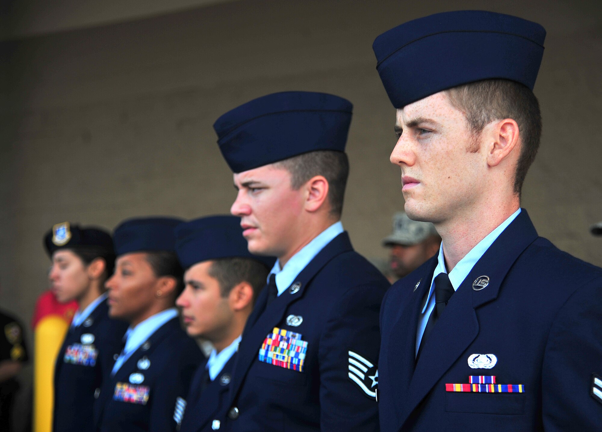 U.S. Air Force Airmen assigned to the 4th Fighter Wing attend a 9/11 memorial ceremony in Goldsboro, N.C., Sept. 11, 2013. Members of Team Seymour and the local community came together to honor those affected by the 9/11 attacks including military members and law enforcement officers. (U.S. Air Force photo by Senior Airman Aubrey White)