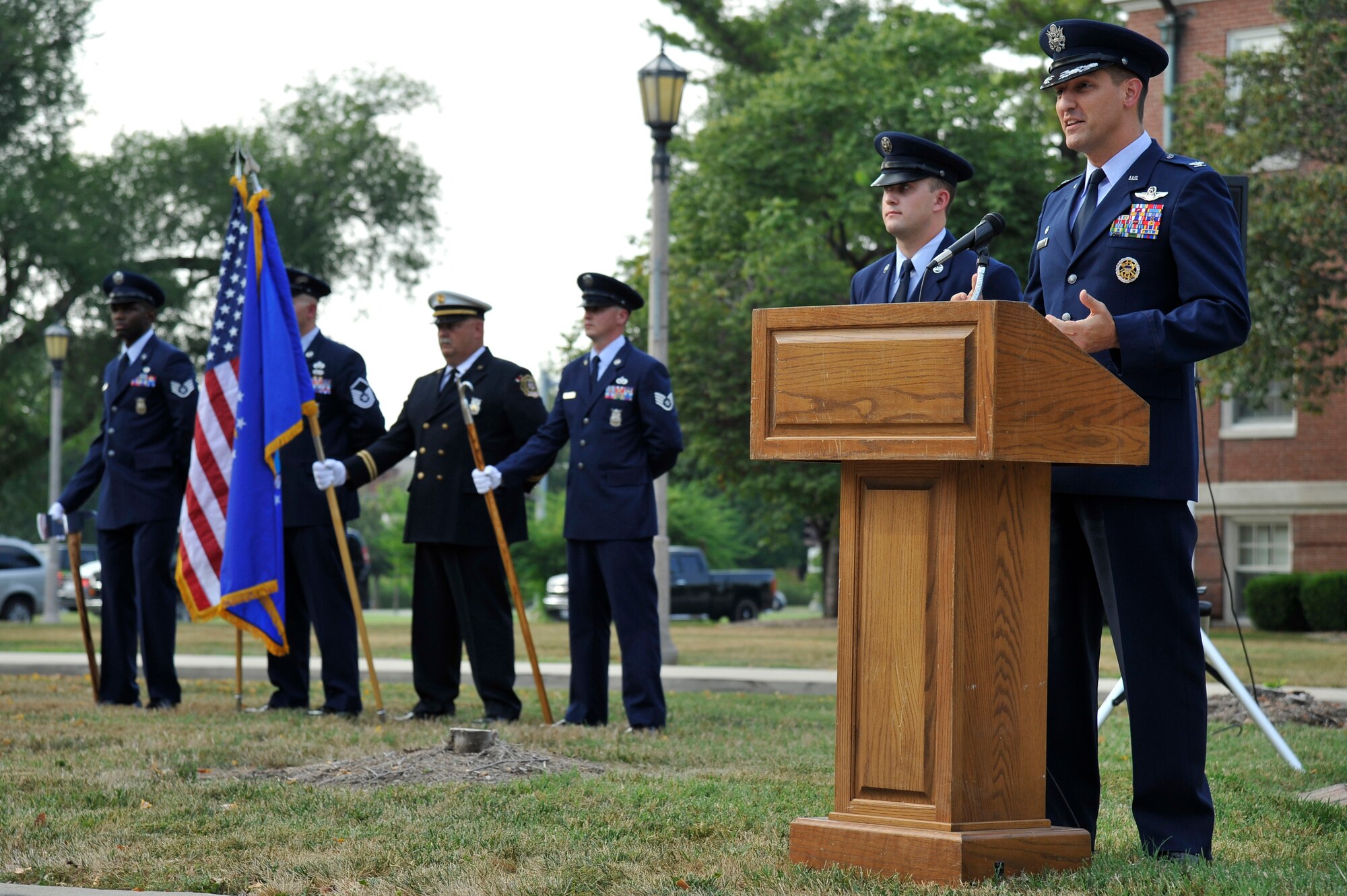 Col. Kyle Kremer offers remarks during a retreat ceremony honoring the victims of the 9/11 terror attacks Sept. 11, 2012, Scott Air Force Base, Ill. The ceremony provided Team Scott a means to reflect on the tragedy that claimed the lives of 2996 people. Kremer is the commander of the 375 Air Mobility Wing. (U.S. Air Force photo/Staff Sgt. Christopher Boitz)