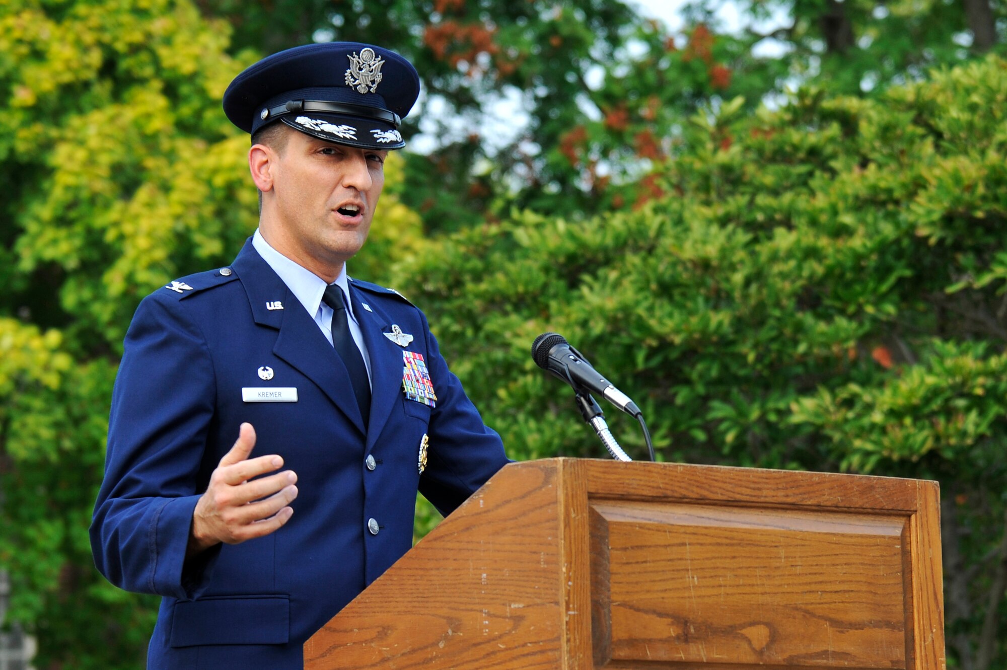 Col. Kyle Kremer offers remarks during a retreat ceremony honoring the victims of the 9/11 terror attacks Sept. 11, 2012, Scott Air Force Base, Ill. The ceremony provided Team Scott a means to reflect on the tragedy that claimed the lives of 2996 people. Kremer is the commander of the 375 Air Mobility Wing. (U.S. Air Force photo/Staff Sgt. Christopher Boitz)