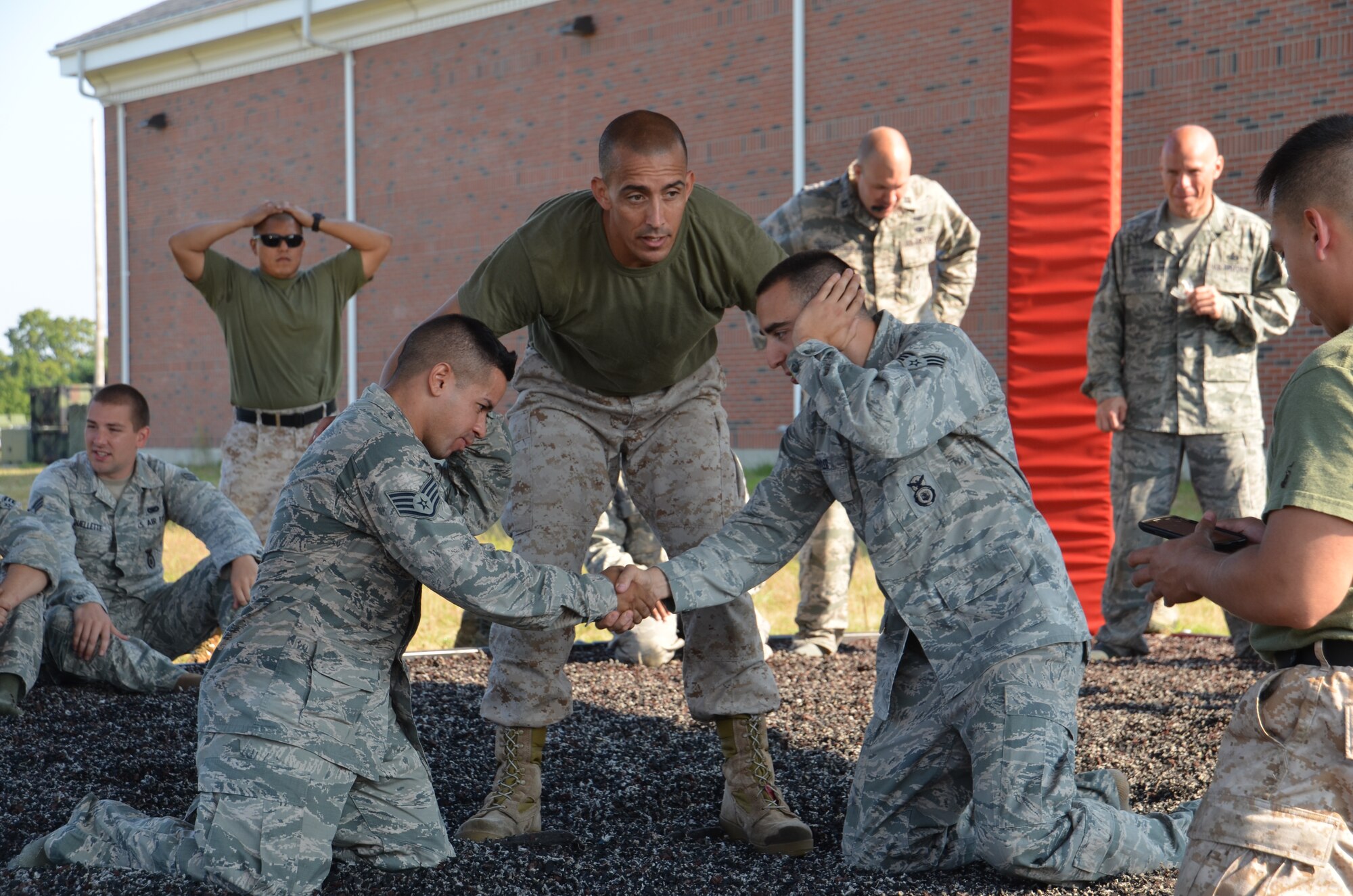 In August, thirty-three of Westover’s Security Forces Airmen participated and received certificates for completion of 27.30 hours of rigorous training, taught by Marine MCMAP instructors attached to the Marine Air Support Squadron-6 on base.The Marine Corps Martial Arts Program is a combination of different martial arts brought together to create one fighting style. MCMAP combines the basics of boxing, Judo and Ju Jitsu. (U.S. Air Force photo/SrA. Kelly Galloway)