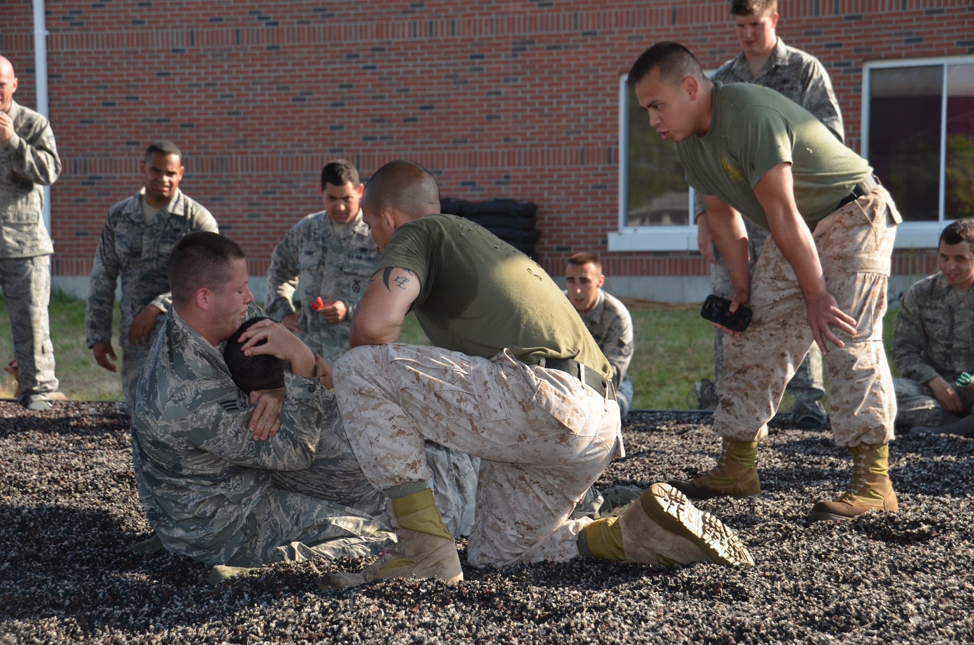 In August, thirty-three of Westover’s Security Forces Airmen participated and received certificates for completion of 27.30 hours of rigorous training, taught by Marine MCMAP instructors attached to the Marine Air Support Squadron-6 on base.The Marine Corps Martial Arts Program is a combination of different martial arts brought together to create one fighting style. MCMAP combines the basics of boxing, Judo and Ju Jitsu. (U.S. Air Force photo/SrA. Kelly Galloway)
