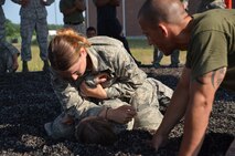 In August, thirty-three of Westover’s Security Forces Airmen participated and received certificates for completion of 27.30 hours of rigorous training, taught by Marine MCMAP instructors attached to the Marine Air Support Squadron-6 on base.The Marine Corps Martial Arts Program is a combination of different martial arts brought together to create one fighting style. MCMAP combines the basics of boxing, Judo and Ju Jitsu. (U.S. Air Force photo/SrA. Kelly Galloway)