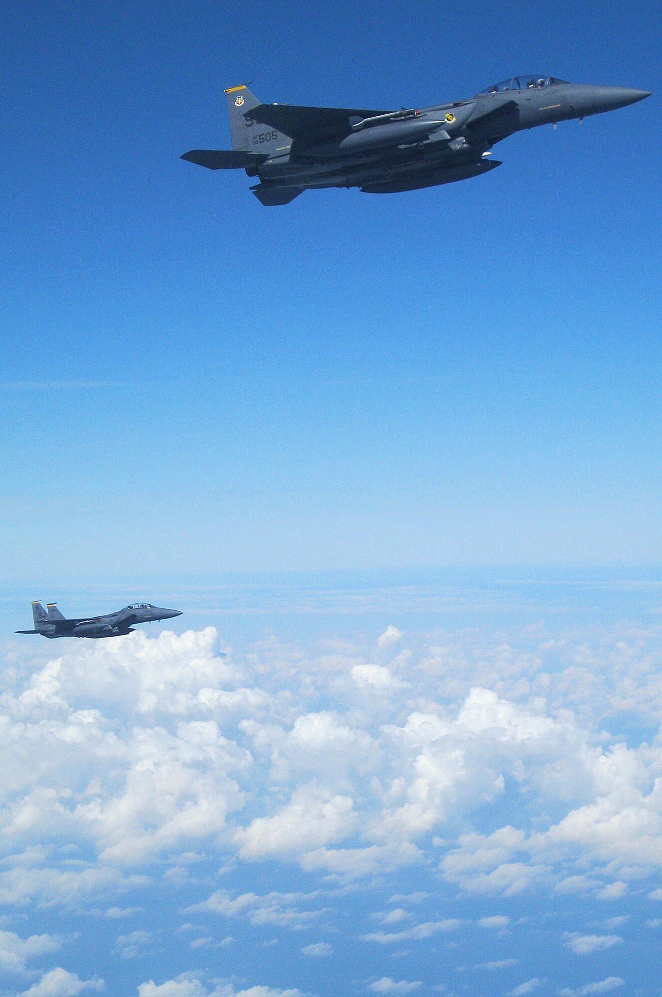 A KC-135R Stratotanker assigned to the 911th Air Refueling Squadron refuels an F-15E Strike Eagle during exercise RAZOR TALON near Seymour Johnson Air Force Base, N.C., Sept. 6, 2013.  RAZOR TALON, a monthly joint-force exercise that combines resources from multiple installations across the East Coast, allows units to keep up-to-date on air-sea training.  (U.S. Air Force photo by Lt. Col. Christine Mau)