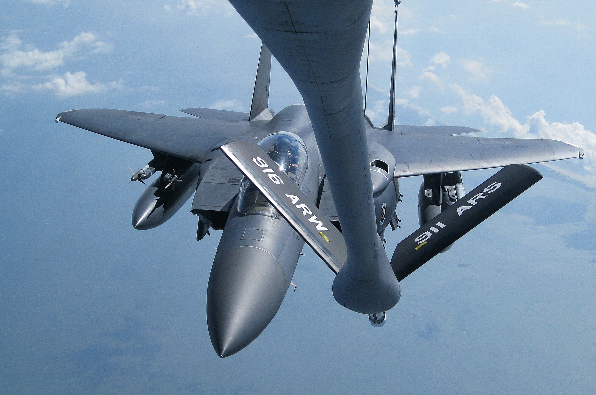 A KC-135R Stratotanker assigned to the 911th Air Refueling Squadron refuels an F-15E Strike Eagle during exercise RAZOR TALON near Seymour Johnson Air Force Base, N.C., Sept. 6, 2013.  RAZOR TALON, a monthly joint-force exercise that combines resources from multiple installations across the East Coast, allows units to keep up-to-date on air-sea training.  (U.S. Air Force photo by Lt. Col. Christine Mau/Released)