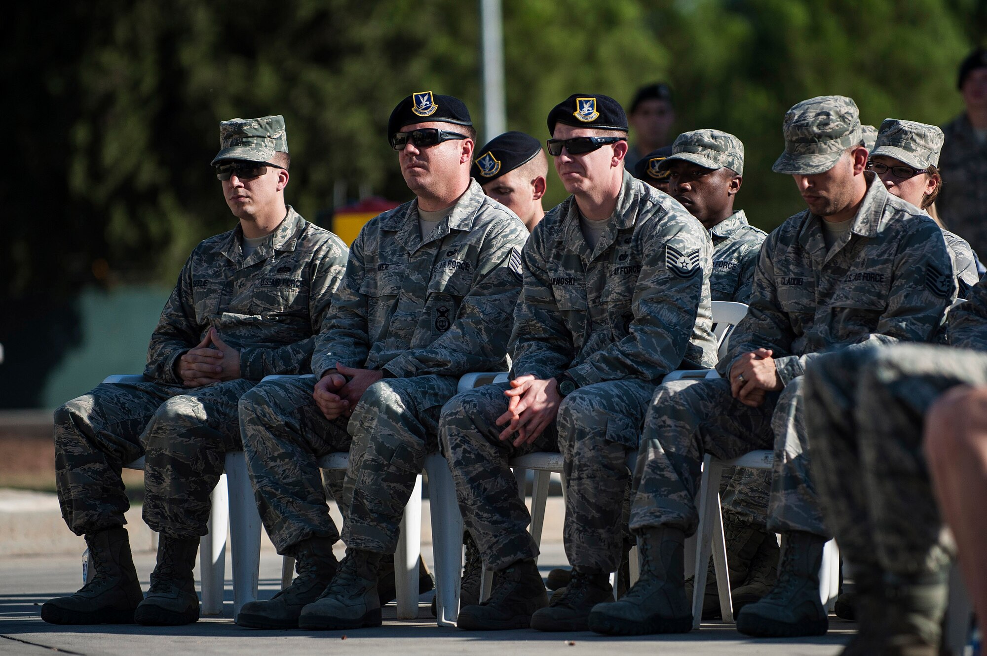 Airmen listen to Col. Sean Gallagher, 39th Mission Support Group commander, as he speaks at the 9/11 Retreat Ceremony Sept. 11, 2013, at Incirlik Air Base, Turkey. The ceremony honored the lives lost 12 years ago during the 9/11 terrorist attacks. (U.S. Air Force photo by Airman 1st Class Nicole Sikorski/Released)