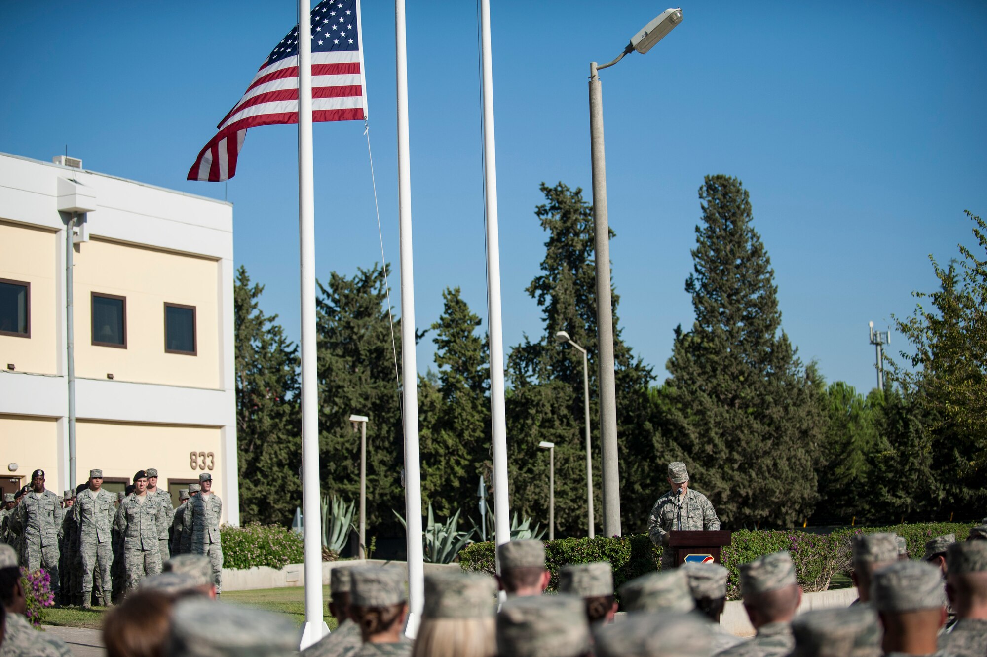 Senior Airman Scott Powers, 39th Medical Operations Squadron personnel reliability program monitor, speaks during a 9/11 Retreat Ceremony Sept. 11, 2013, at Incirlik Air Base, Turkey. The retreat was held in remembrance of the victims of the 9/11 terrorist attacks on the United States. (U.S. Air Force photo by Airman 1st Class Nicole Sikorski/Released)