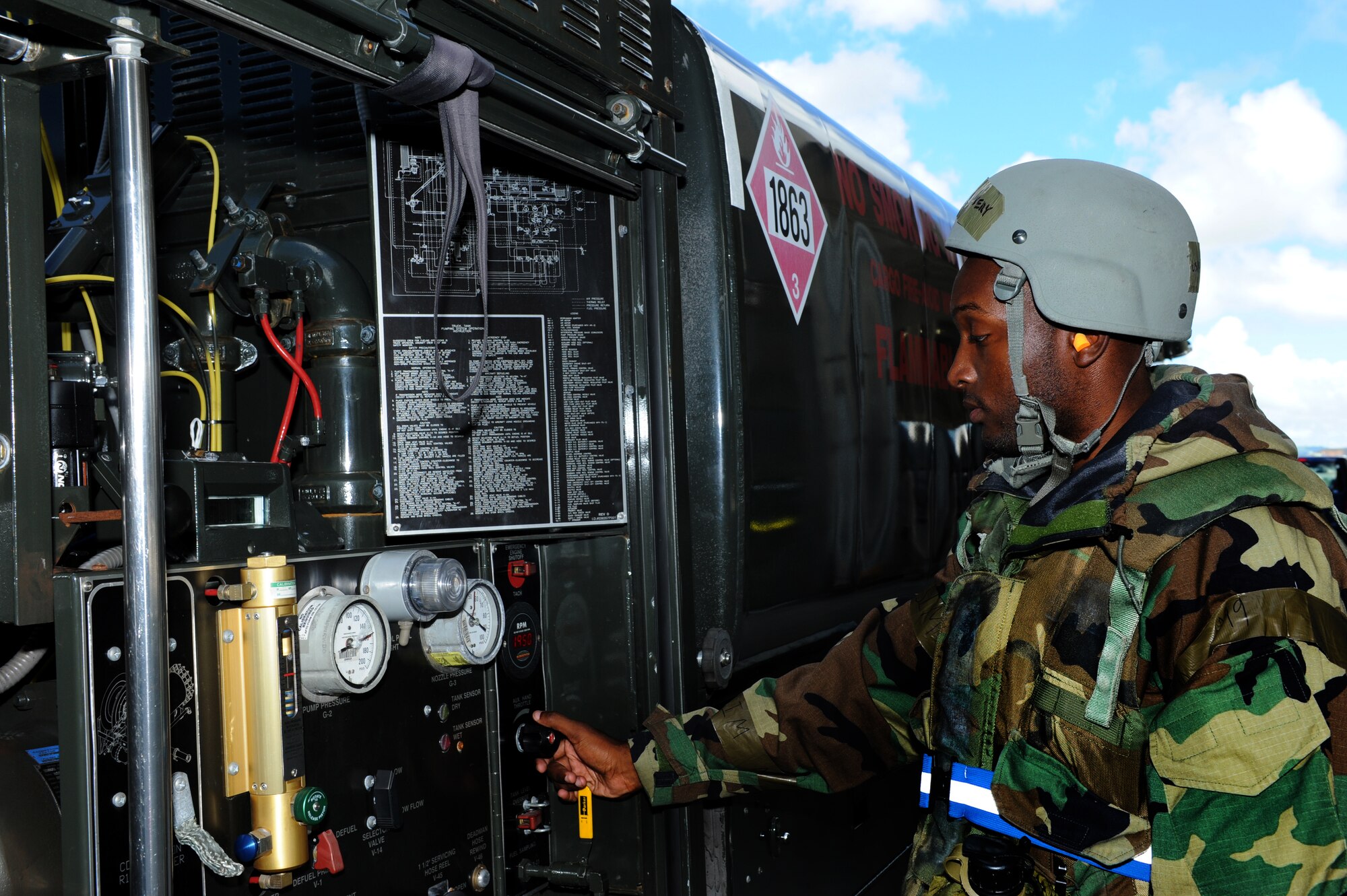 U.S. Air Force Airman 1st Class Brandon Avery, 18th Logistics Readiness Squadron distribution fuels operator, operates an R-11 refuel vehicle for a ground refuel mission during a local operational readiness exercise on Kadena Air Base, Japan, Sept. 12, 2013. The 18th Wing periodically conducts LOREs to maintain proficiency in their capabilities to support the common defense of the Asia-Pacific region. (U.S. Air Force photo by Airman 1st Class Hailey R. Davis)
