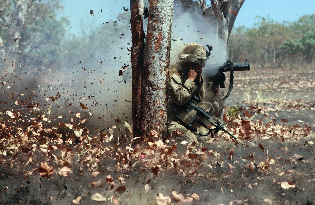 Marines fire a shoulder-launched, multipurpose assault weapon as part of a movement-to-contact training evolution during Exercise Koolendong Sept. 3 at Bradshaw Field Training Area, Northern Territory, Australia. The Marines are with Company L, 3rd Battalion, 3rd Marine Regiment, Marine Rotational Force-Darwin, III Marine Expeditionary Force.
