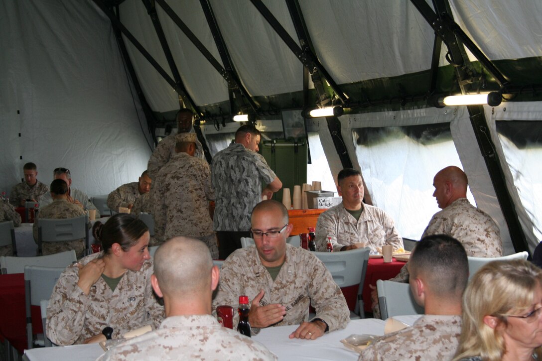 Patrons dine at the field mess Aug. 21 at Camp Kinser during exercise Ulichi Freedom Guardian 2013. The field mess was part of a competition for the Major General W.P.T. Hill award that took place from Jul. 22 – Aug. 22. 