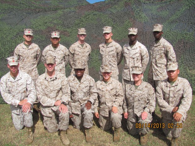 Marines who worked as mess men pose for a group photo Aug. 14 at Camp Kinser during exercise Ulichi Freedom Guardian 2013. The Marines conducted the field mess in conjunction with UFG 2013 to compete for the Major General W.P.T. Hill award, which is competed for across the Marine Corps. 