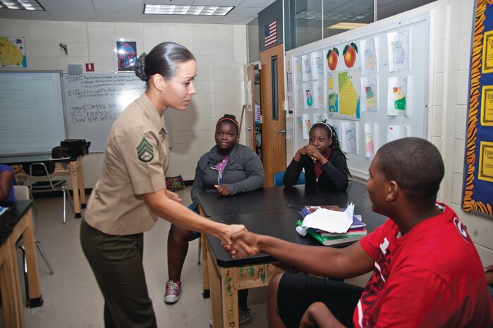 Staff Sgt. Juana Snell, equal opportunity advisor, Marine Corps Logistics Command, engages students at Southside Middle School, Albany, Ga., Sept. 23.