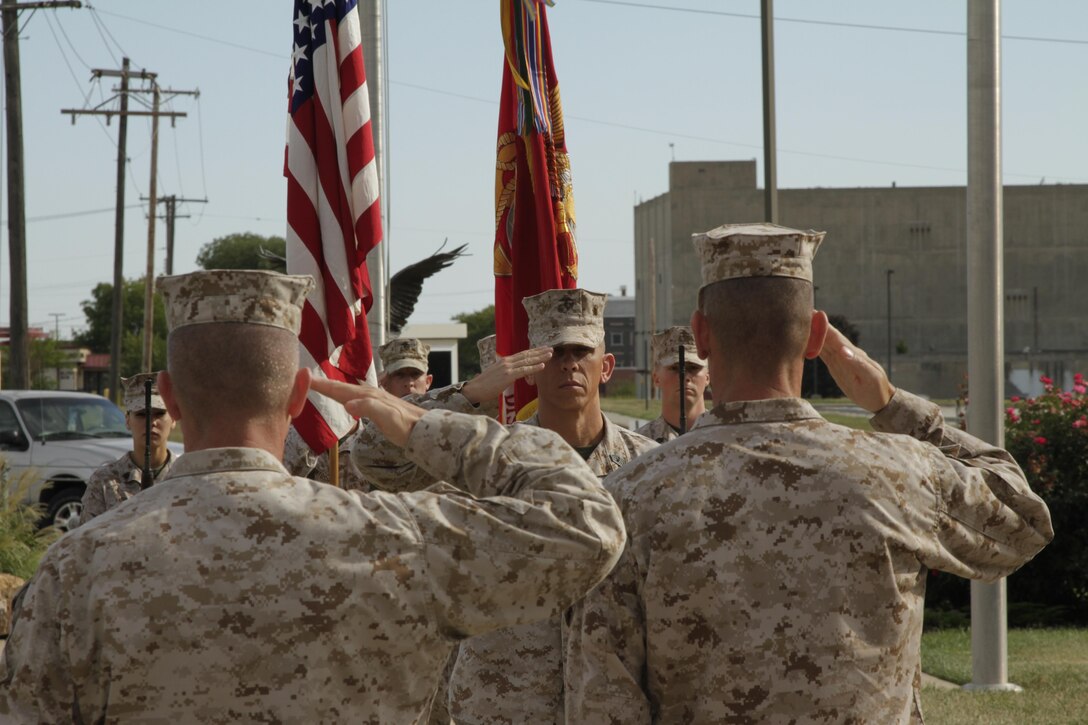 Master Gunnery Sgt. Marc Carbonetto, operations chief of the 9th Marine Corps District, salutes during his retirement ceremony in Kansas City, Mo. Sept. 13, 2013. Carbonetto reitres from the Marine Corps after 26 years of service.