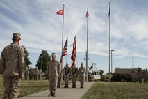 Master Gunnery Sgt. Marc Carbonetto, operations chief of the 9th Marine Corps District stands at position of attention during his retirement ceremony in Kansas City, Mo. Sept. 13, 2013. Carbonetto served 26 years in the Marine Corps.
