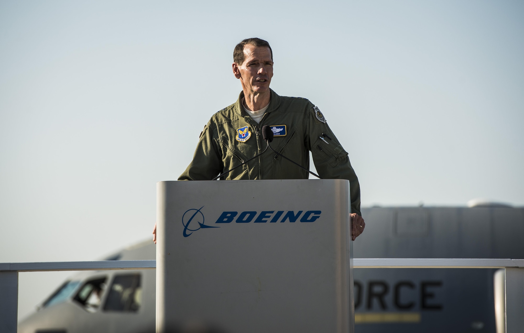 Lt. Gen. Stanley Clarke, Air National Guard director, speaks to Boeing employees at the final U.S. Air Force C-17 Globemaster III, P-223, delivery ceremony Sept. 12, 2013, at Long Beach, Calif.