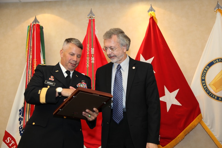 IWR and ICIWaRM Director Robert Pietrowsky accepts the 2013 LTG John W. Morris Civilian of the Year Award from Major General Todd T. Semonite at the National Awards Dinner.