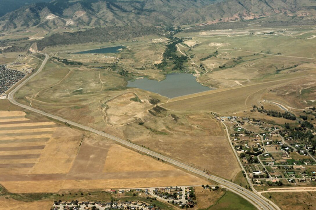 Bear Creek Dam is located on the southwest edge of suburban Lakewood at the confluence of Bear Creek and Turkey Creek, construction of the dam was authorized in 1968 and was completed in 1982. Bear Creek Lake is less than 1 mile long and has an average depth of 48 feet. The lake drains an area of approximately 236 square miles.