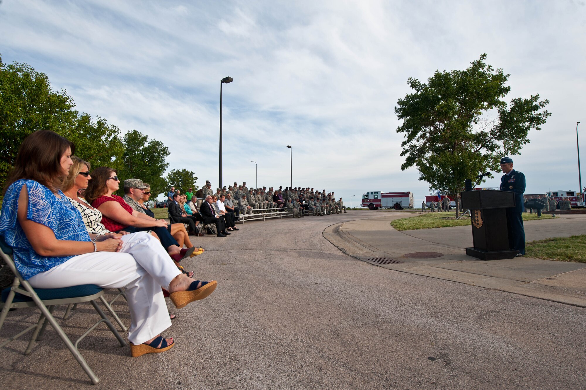 Col. Kevin Kennedy, 28th Bomb Wing commander, speaks on the significance of honoring America’s fallen during the 9/11 Retreat ceremony at Ellsworth Air Force Base, S.D., Sept. 11, 2013. Airmen, family members and civilians from the local community gathered to recognize and honor the 3,000 men and women who lost their lives 12 years ago. (U.S. Air Force photo by Airman 1st Class Zachary Hada/Released)