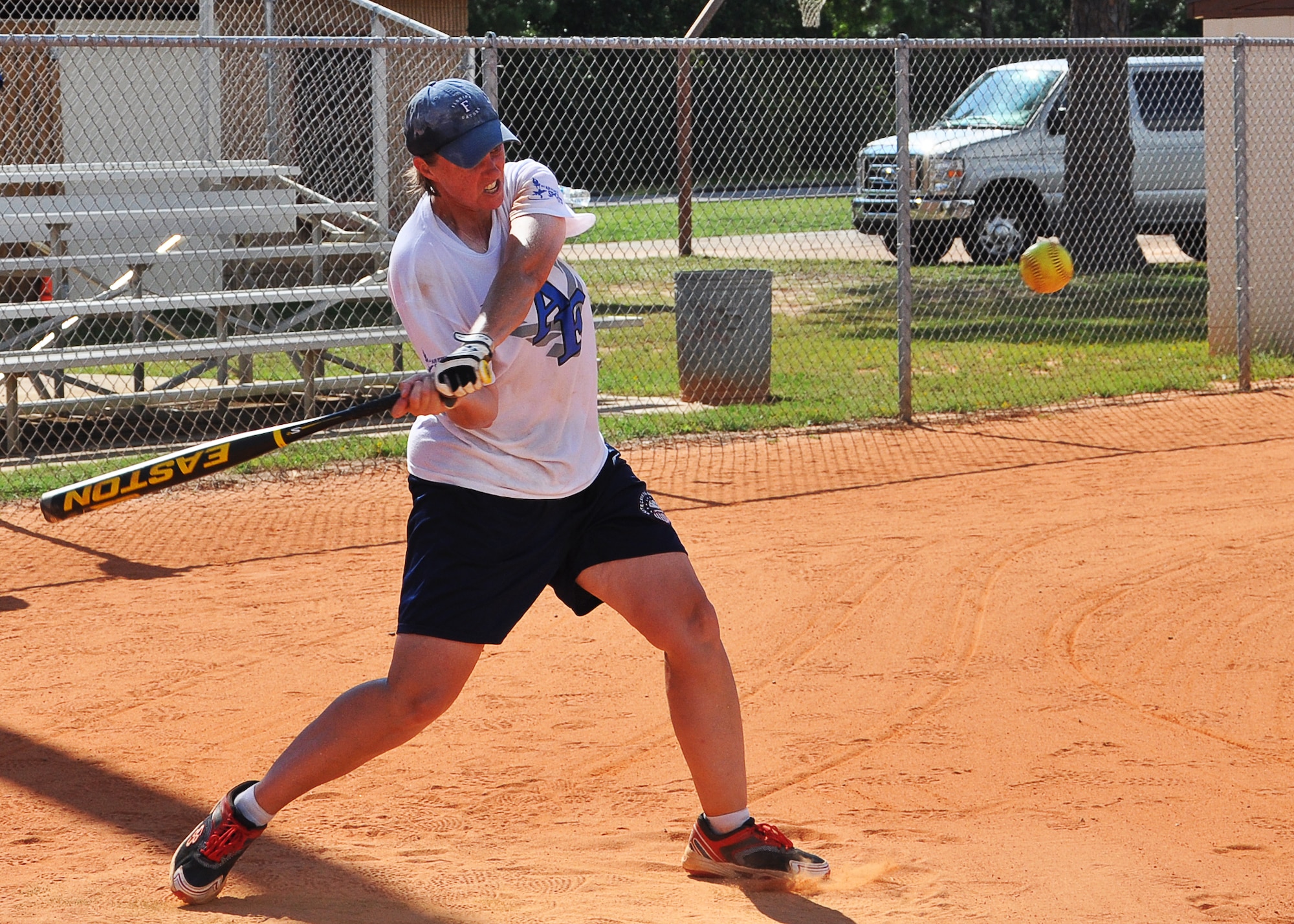 U.S. Air Force Senior Master Sgt. Laurie Doughty, Schriever Air Force Base, Colo., hits a softball Sept. 5, 2013, Tyndall AFB, Fla. She was training with All-Air Force women’s softball team to prepare for the All-Armed Forces Tournament starting Sept. 14 at Fort Sill, Okla. The All-Armed Forces Tournament pits the best players of the Air Force, Army and Marines against one another for a five-day playoff. (U.S. Air Force photo by Airman 1st Class Alex Echols/Released) 