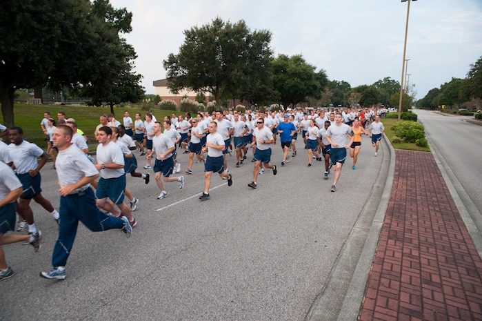 Members of Team Charleston participate in the "Run the Runway 5k" Sept. 13, 2013 at Joint Base Charleston, S.C. This is the first time that "Run the Runway" was used as a commander's challenge and the run brought in over 700 Joint Base Charleston participants. (U.S. Air Force photo/Senior Airman Ashlee Galloway)