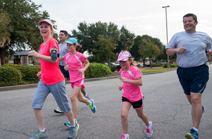 Joint Base Charleston family members participate in the "Run the Runway 5k" Sept. 13, 2013 at Joint Base Charleston, S.C. This is the first time that "Run the Runway" was used as a commander's challenge and the run brought in over 700 Joint Base Charleston participants. (U.S. Air Force photo/Senior Airman Ashlee Galloway)
