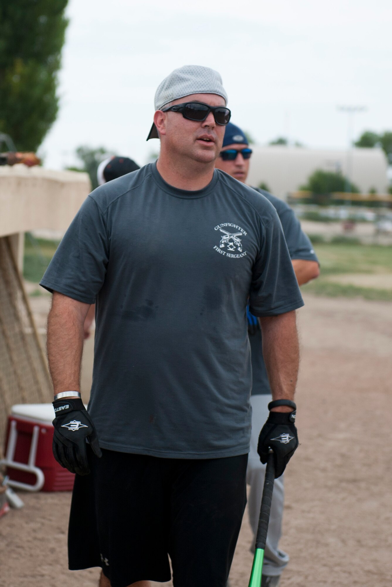 U.S. Air Force Master Sgt. Kelly Riedel, 366th Medical Group first sergeant, prepares to bat during a softball game, July 26, 2013 at Mountain Home Air Force Base, Idaho. Riedel and other first sergeants held an annual Operation Warm Heart softball tournament to raise money for Airmen in need. (U.S. Air Force photo by Airman 1st Class Brittany Chase/Released)