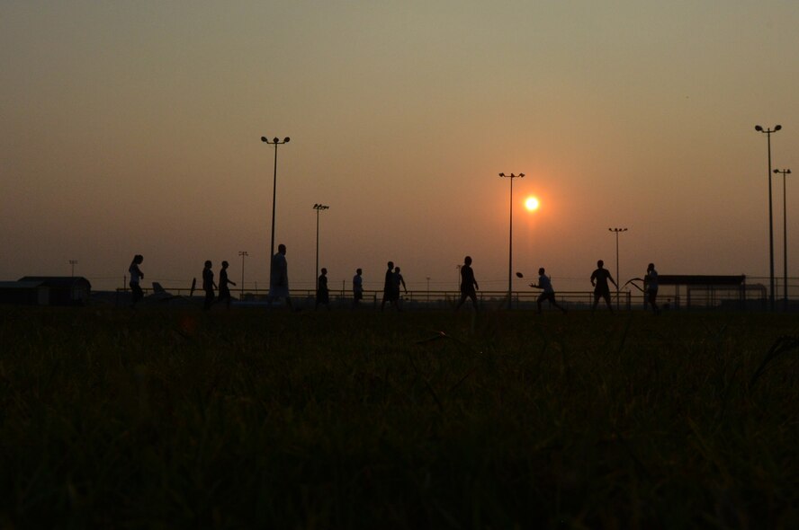 Airmen from the 2nd Contracting Squadron play ultimate football for Wingman Week on Barksdale Air Force Base, La., Sept. 13, 2013. Ultimate football is a combination between ultimate frisbee and football. Wingman Week is a base wide initiative for Airmen to come together and get to know each other. (U.S. Air Force photo/Senior Airman Micaiah Anthony)