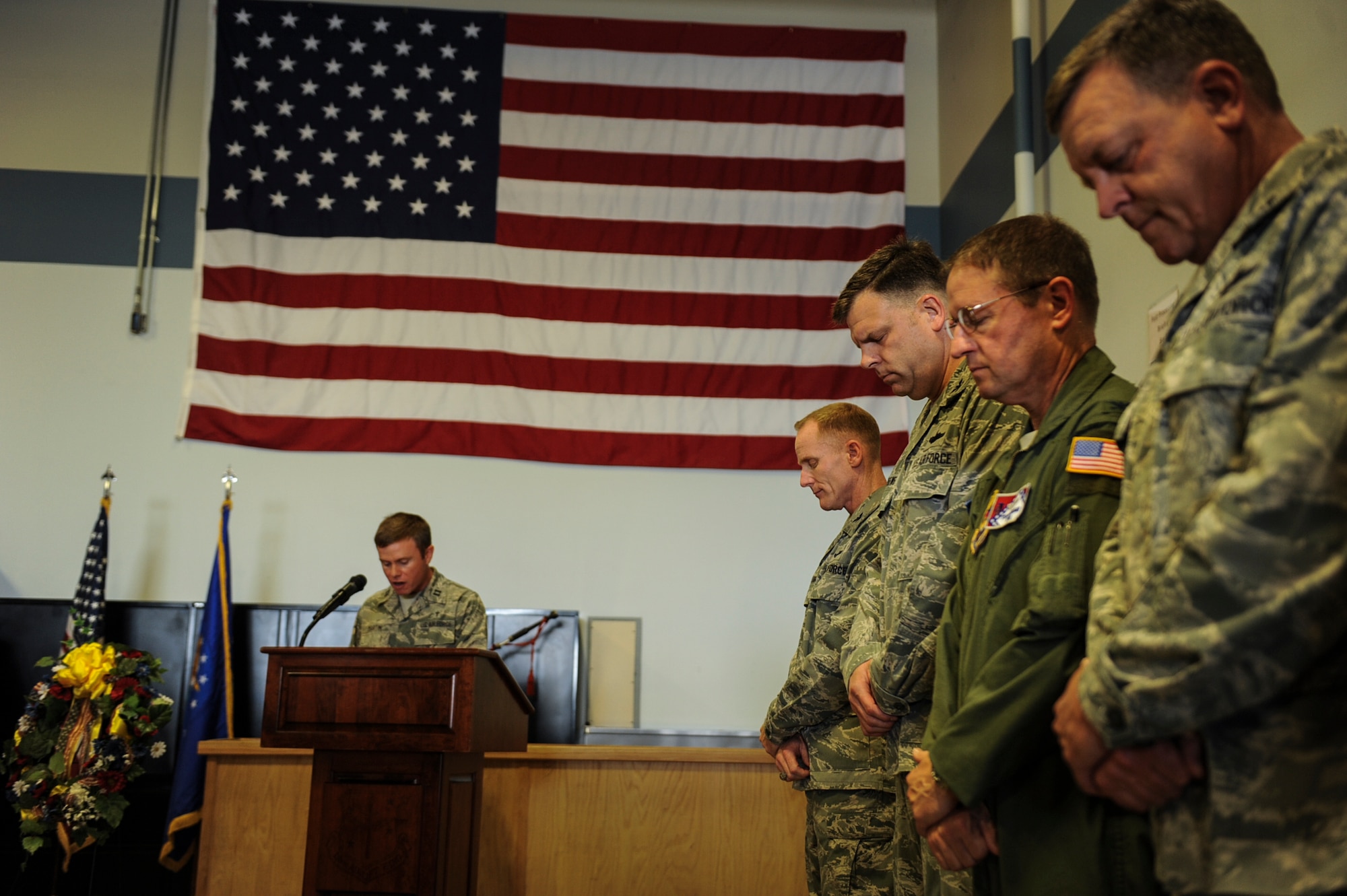 Chaplain (Capt.), William Martin, prays before remembrance ceremony Sept. 11, 2013, at Little Rock Air Force Base, Ark. Each wing commander on base summarized and commemorated the attacks that happened at the Twin Towers, the Pentagon and in Pennsylvania. (U.S. Air Force photo by Airman 1st Class Cliffton Dolezal)