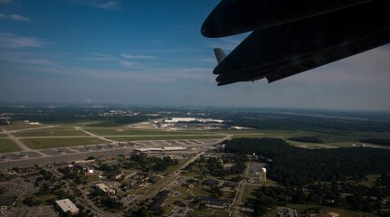 The C-17 Globemaster III, P-223, flies over Joint Base Charleston, S.C., during the aircrafts inaugural flight Sept. 12, 2013. Lt. Gen. James Jackson, Air Force Reserve commander, performed the take-off from California with Gen. Paul Selva, Air Mobility Command commander, taking over mid-flight and Lt. Gen. Stanley Clarke, Air National Guard director, landing the aircraft at Joint Base Charleston, S.C. This historical event comes more than 20 years after the 437th Airlift Wing and the 315th Airlift Wing took delivery of the very first C-17 to enter the Air Force inventory June 14, 1993 and marks the successful completion of C-17 production for the U.S. Air Force. (U.S. Air Force photo/ Senior Airman Dennis Sloan)