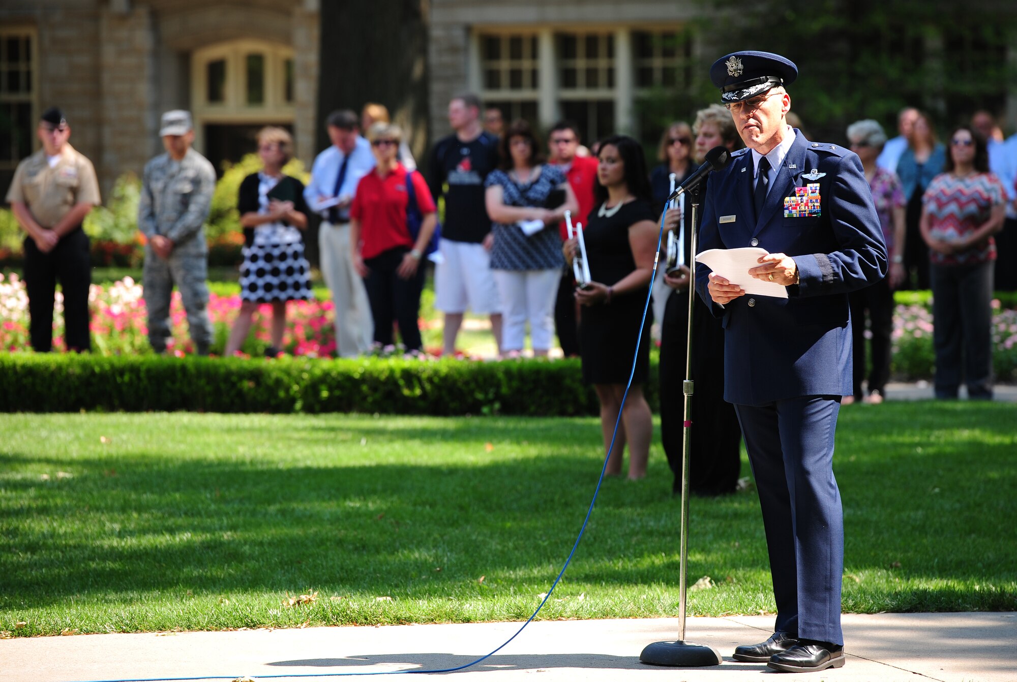 U.S. Air Force Brig. Gen. Thomas A. Bussiere, 509th Bomb Wing commander from Whiteman Air Force Base, Mo., gives a speech during a 9/11 Memorial Ceremony at the University of Central Missouri in Warrensburg, Mo., Sept. 11, 2013. The ceremony was open to all members of the UCM and Team Whiteman communities to pay respect to those who lost their lives during the Sept. 11, 2001, terrorist attacks. (U.S. Air Force photo by Staff Sgt. Nick Wilson/Released)