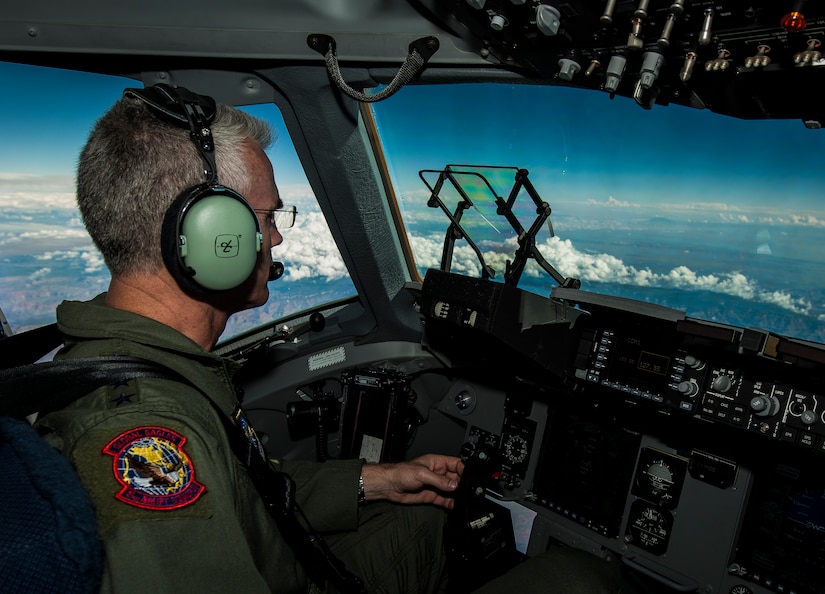 General Paul Selva, Air Mobility Command commander, takes control of C-17 Globemaster III, P-223, mid-flight during the inaugural flight of the final U.S. Air Force C-17 Sept. 12, 2013. Lt. Gen. James Jackson, Air Force Reserve commander, performed the take-off from California and Lt. Gen. Stanley Clarke, Air National Guard director, landed the aircraft at Joint Base Charleston, S.C. This historical event comes more than 20 years after the 437th Airlift Wing and the 315th Airlift Wing took delivery of the very first C-17 to enter the Air Force inventory June 14, 1993 and marks the successful completion of C-17 production for the U.S. Air Force. (U.S. Air Force photo/ Senior Airman Dennis Sloan)