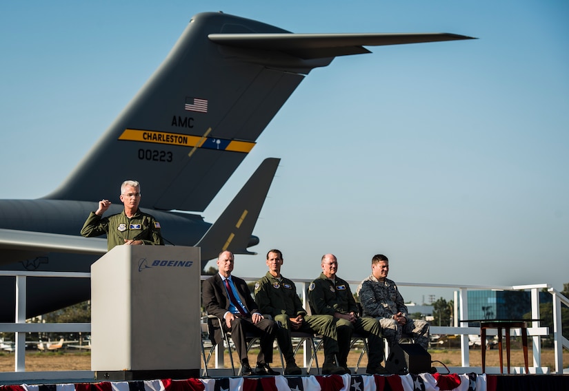 Gen. Paul Selva, Air Mobility Command commander, speaks to Boeing employees at the final U.S. Air Force C-17 Globemaster III, P-223, delivery ceremony Sept. 12, 2013, at Long Beach, Calif. The C-17 was flown from California to Joint Base Charleston, S.C., by pilots to include Selva, Lt. Gen. Stanley Clarke, Air National Guard director, and Lt. Gen. James Jackson, Air Force Reserve commander. This historical event comes more than 20 years after the 437th Airlift Wing and the 315th Airlift Wing took delivery of the very first C-17 to enter the Air Force inventory June 14, 1993 and marks the successful completion of C-17 production for the U.S. Air Force. (U.S. Air Force photo/ Senior Airman Dennis Sloan)