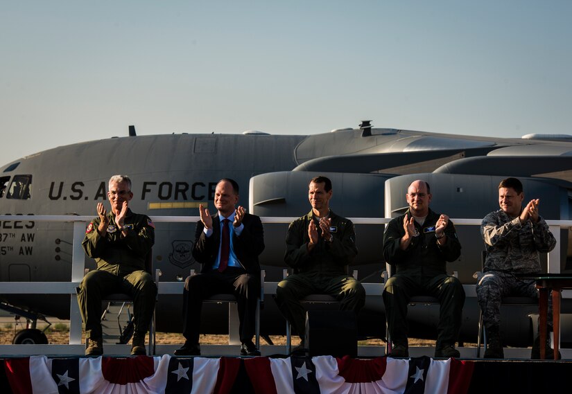 U.S. Air Force leaders and a distinguished guest applaud during a ceremony held by Boeing commemorating the final U.S. Air Force C-17 Globemaster III, P-223 Sept. 12, 2013, at Long Beach, Calif. The C-17 was flown from California to Joint Base Charleston, S.C., by pilots to include Gen. Paul Selva, Air Mobility Command commander, Lt. Gen. James Jackson, Air Force Reserve commander, and Lt. Gen. Stanley Clarke, Air National Guard director. This historical event comes more than 20 years after the 437th Airlift Wing and the 315th Airlift Wing took delivery of the very first C-17 to enter the Air Force inventory June 14, 1993 and marks the successful completion of C-17 production for the U.S. Air Force. (U.S. Air Force photo/ Senior Airman Dennis Sloan)