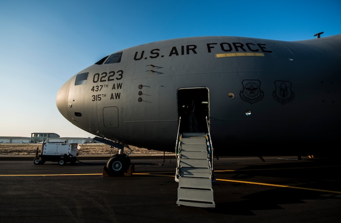 The final U.S. Air Force C-17 Globemaster III, P-223, is rolled off the Boeing assembly line and placed on the flight line during a ceremony celebrating 20 years of delivering C-17s to the U.S. Air Force Sept. 12, 2013, at Long Beach, Calif. The C-17 was flown from California to Joint Base Charleston, S.C., by pilots to include Gen. Paul Selva, Air Mobility Command commander, Lt. Gen. James Jackson, Air Force Reserve commander, and Lt. Gen. Stanley Clarke, Air National Guard director. This historical event comes more than 20 years after the 437th Airlift Wing and the 315th Airlift Wing took delivery of the very first C-17 to enter the Air Force inventory June 14, 1993 and marks the successful completion of C-17 production for the U.S. Air Force. (U.S. Air Force photo/ Senior Airman Dennis Sloan)