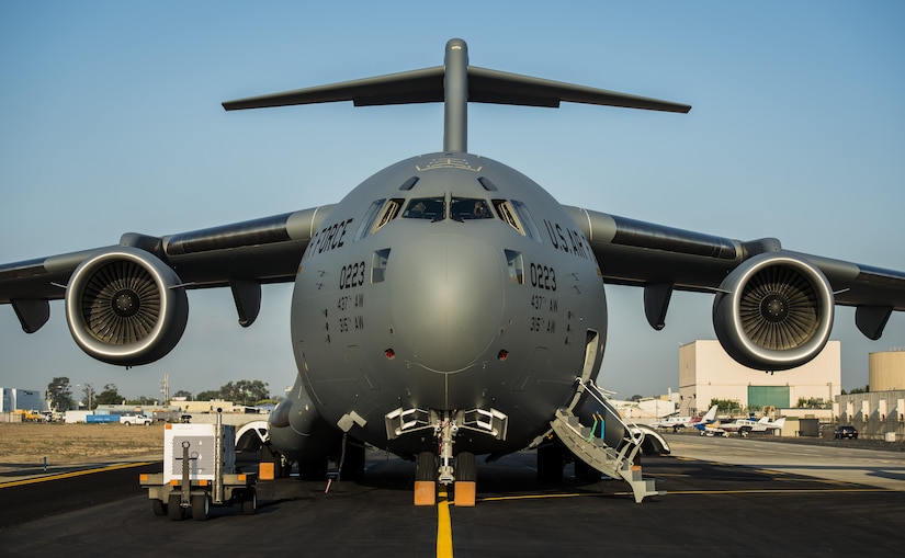 The final U.S. Air Force C-17 Globemaster III, P-223, is rolled off the Boeing assembly line and placed on the flight line during a ceremony celebrating 20 years of delivering C-17s to the U.S. Air Force Sept. 12, 2013, at Long Beach, Calif. The C-17 was flown from California to Joint Base Charleston, S.C., by pilots to include Gen. Paul Selva, Air Mobility Command commander, Lt. Gen. James Jackson, Air Force Reserve commander, and Lt. Gen. Stanley Clarke, Air National Guard director. This historical event comes more than 20 years after the 437th Airlift Wing and the 315th Airlift Wing took delivery of the very first C-17 to enter the Air Force inventory June 14, 1993 and marks the successful completion of C-17 production for the U.S. Air Force. (U.S. Air Force photo/ Senior Airman Dennis Sloan)