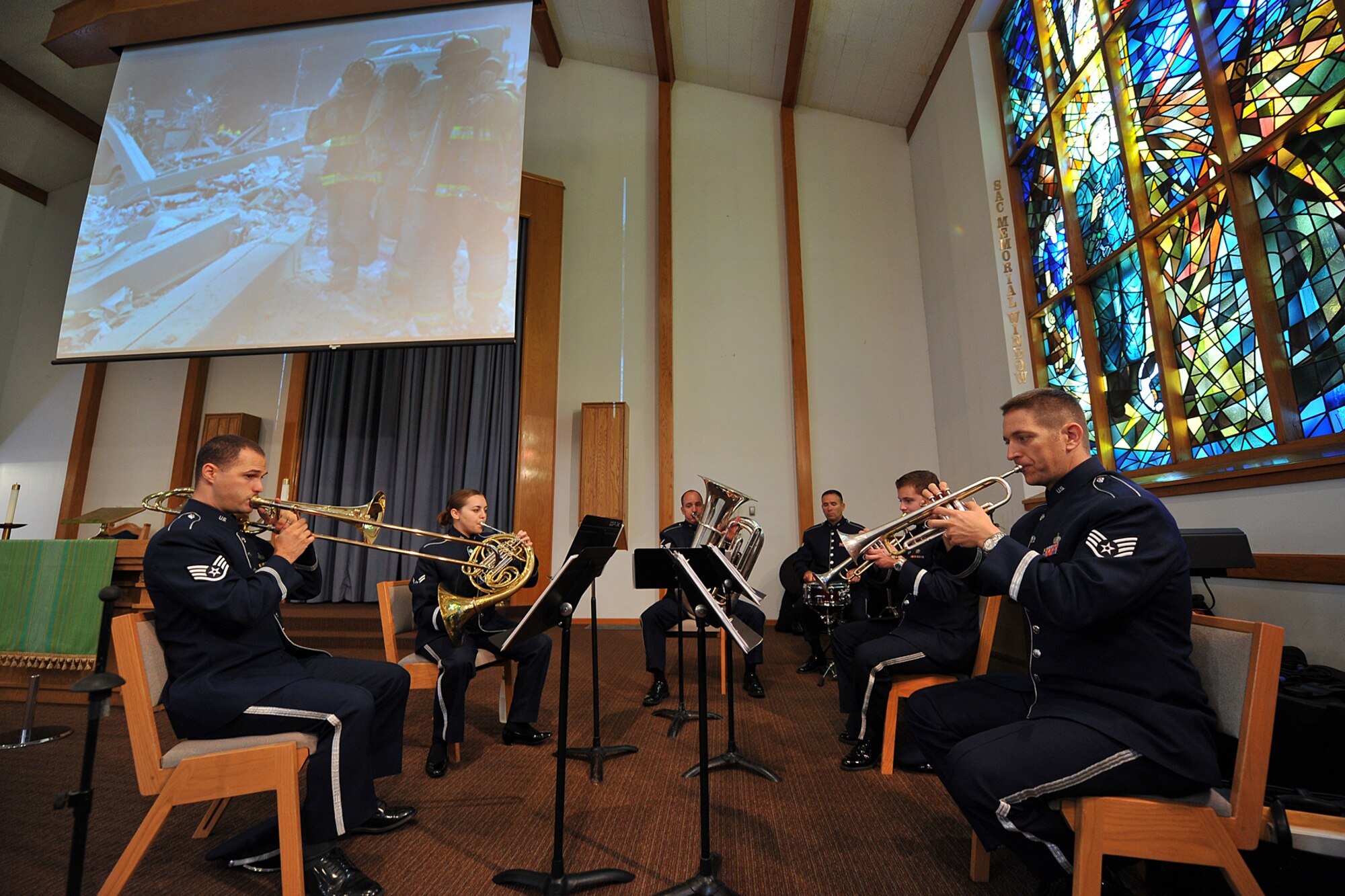U.S. Air Force Heartland of America Band, Air Combat Command, performs before the 9/11 memorial service held in SAC Chapel on Offutt Air Force Base, Neb., Sept. 11. On Sept. 11, 2001, 19 militants associated with the Islamic extremist group al-Qaeda hijacked four airliners and carried out suicide attacks against targets in the United States. Two of the planes were flown into the towers of the World Trade Center in New York City, a third plane hit the Pentagon just outside Washington, D.C., and the fourth plane crashed in a field in Pennsylvania. (U.S. Air Force photo by Charles Haymond/Released)