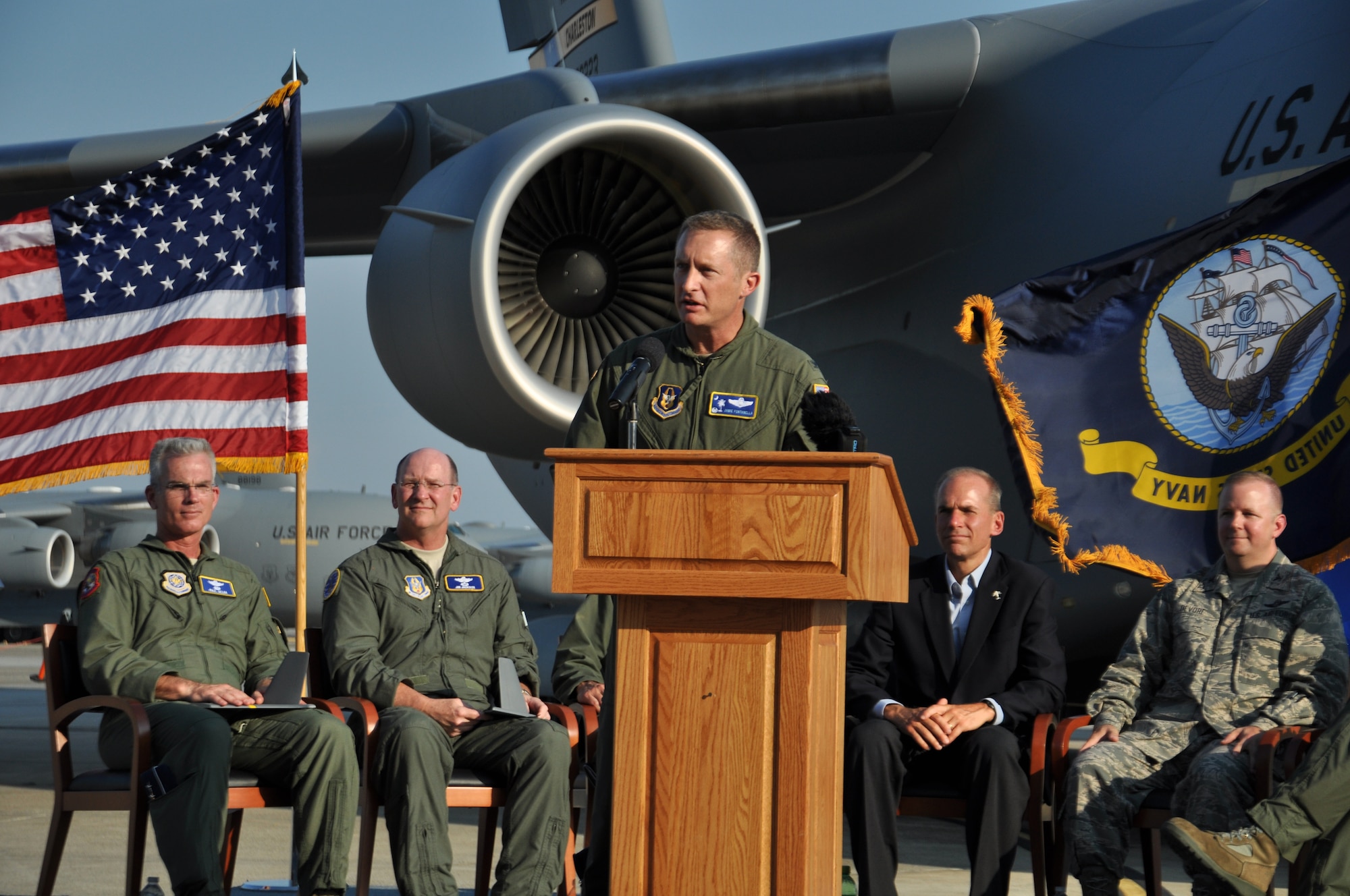 Col. James Fontanella delivers inspiring words about the C-17 and the men and women behind it during a grand ceremony celebrating 20 years of the C-17 Globemaster III Sept. 12 at Joint Base Charleston, S.C. (U.S. Air Force photo / Michael Dukes)