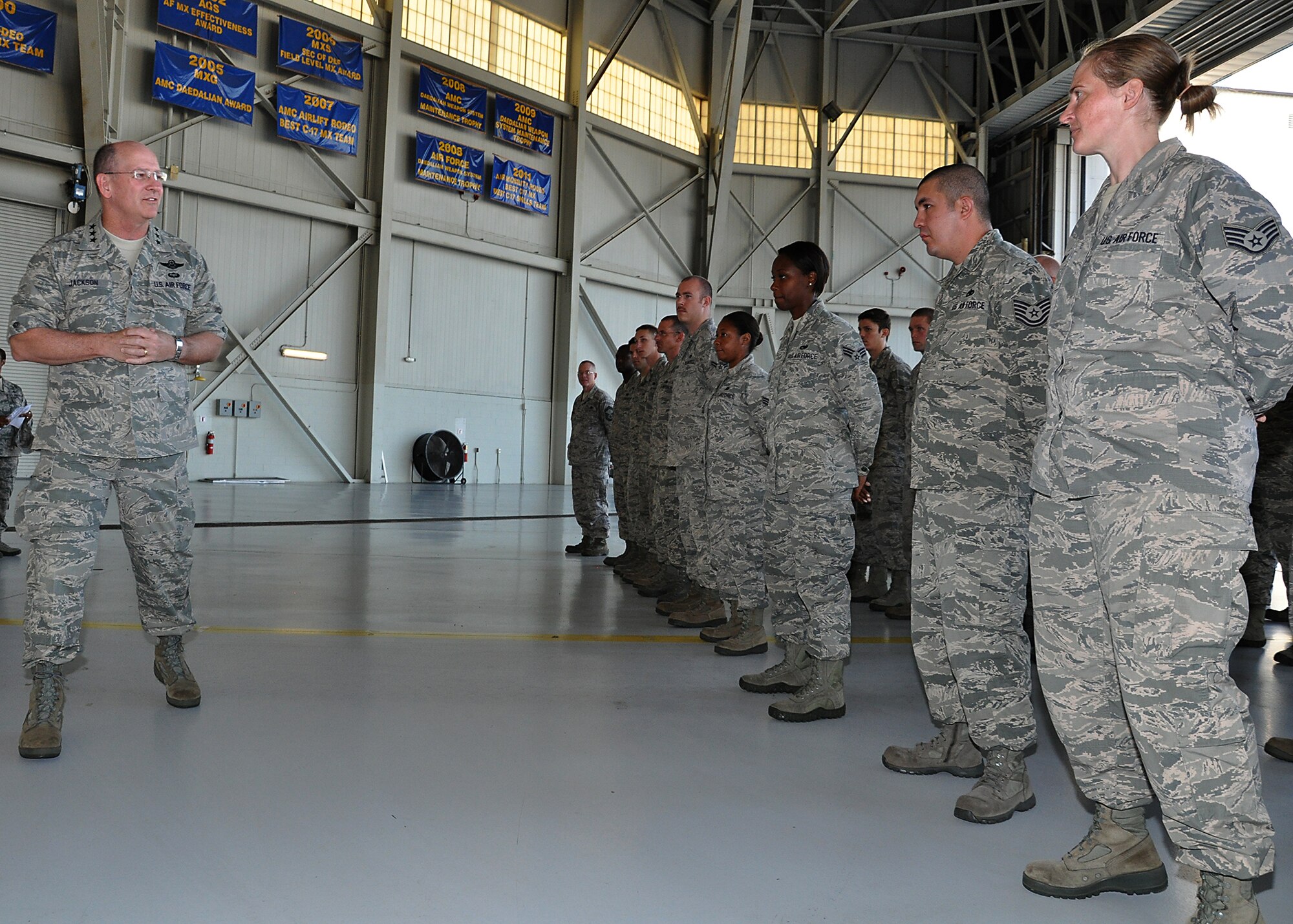 Lt. Gen. James Jackson, Air Force Reserve Command commander, speaks with 315th Maintenance Group Reservists during his visit to Joint Base Charleston, S.C. The general helped deliver the Air Force's final C-17 Globemaster III Sept. 12. (U.S. Air Force Reserve photo / Michael Dukes)