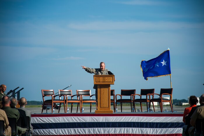 Col. Jeffrey DeVore, Joint Base Charleston commander, gives a speech during a ceremony commemorating the delivery of the final U.S. Air Force C-17 Globemaster III, P-223, Sept. 12, 2013, on the flight line at Joint Base Charleston - Air Base, S.C. This historical event comes more than 20 years after the 437th Airlift Wing and the 315th Airlift Wing took delivery of the very first C-17 to enter the Air Force inventory June 14, 1993 and marks the successful completion of C-17 production for the U.S. Air Force. (U.S. Air Force photo/ Senior Airman George Goslin)