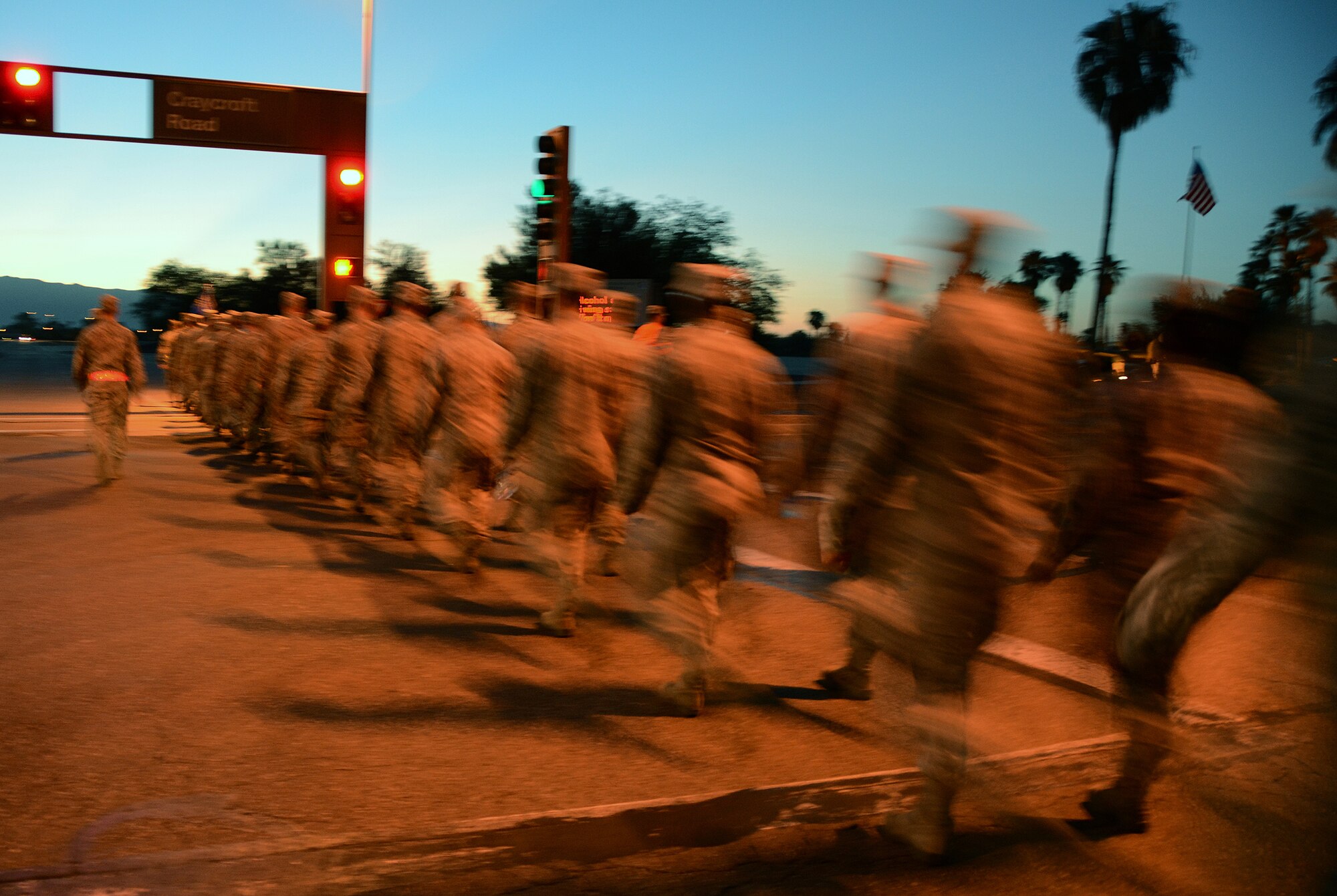 Members of the 612th Air Communication Squadron march around Davis-Monthan AFB, Ariz., in remembrance of the 9/11 victims, Sept. 11, 2013.  As members marched they recalled where they were during the attacks.  (USAF photo by Staff Sgt. Heather Redman/Released)