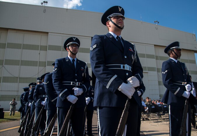 The Joint Base Charleston Honor Guard stands in position waiting to welcome the delivery of P-223 Sept. 12, 2013, at Joint Base Charleston - Air Base, S.C. Joint Base Charleston received the last U.S. Air Force C-17 Globemaster III during a delivery ceremony on the flight line. This historical event comes more than 20 years after the 437th Airlift Wing and the 315th Airlift Wing took delivery of the very first C-17 to enter the Air Force inventory June 14, 1993 and marks the successful completion of C-17 production for the U.S. Air Force. (U.S. Air Force photo/Tech. Sgt. Rasheen Douglas)
