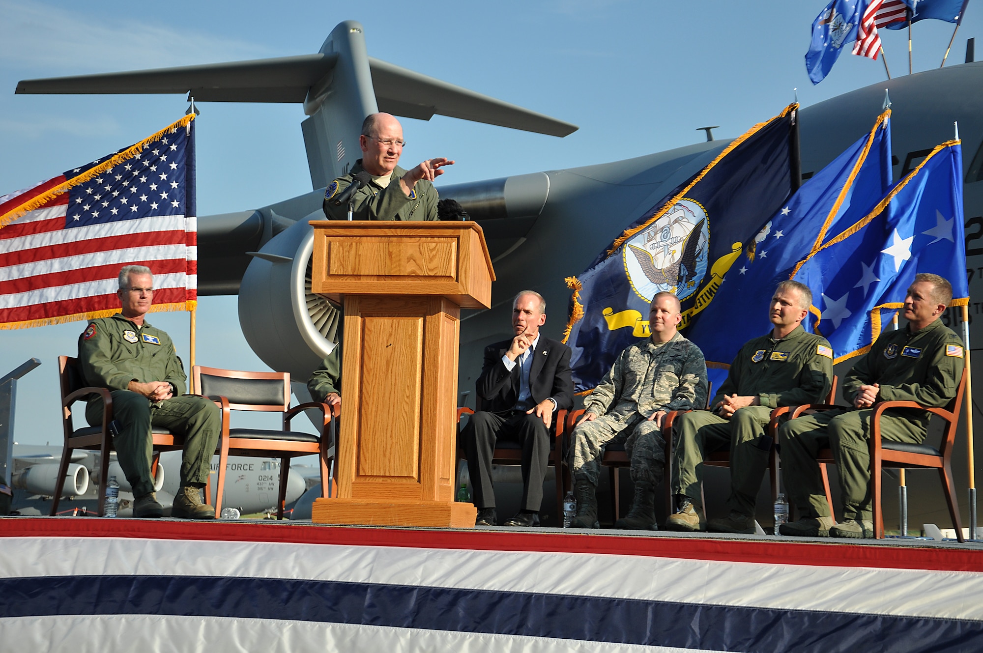 Lt. Gen. James Jackson, AFRC commander, acknowledges Chief Master Sgt. James Macko, 315th AMXS, for helping to deliver the first and last Air Force C-17 Globemaster. The official party flew the jet to Joint Base Charleston, S.C. from the Boeing C-17 Factory in Long Beach, Calif. on Sept. 12 to a crowd of more than 1,200 people and a grand celebration celebrating the first 20 years of the Globemaster III. (U.S. Air Force Photo/Michael Dukes)
