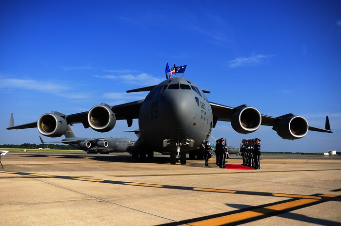 The Joint Base Charleston honor guard salutes during a ceremony held to commemorate the delivery of the final U.S. Air Force C-17 Globemaster III, P-223,  Sept. 12, 2013, on the flight line at JB Charleston - Air Base, S.C.  This historical event comes more than 20 years after the 437th Airlift Wing and the 315th Airlift Wing took delivery of the very first C-17 to enter the Air Force inventory June 14, 1993 and marks the successful completion of C-17 production for the U.S. Air Force. (U.S. Air Force photo/ Airman 1st Class Chacarra Neal)